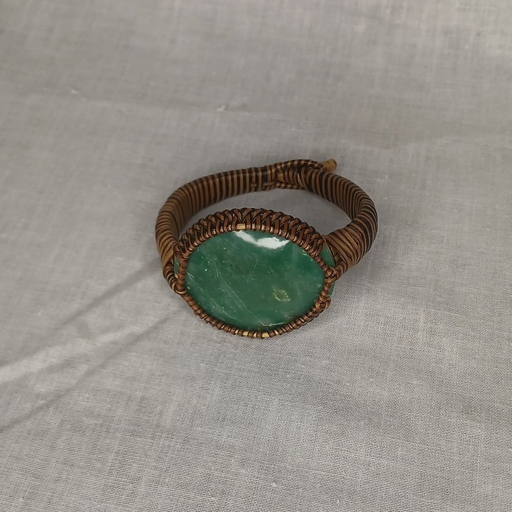 Rattan wrapped nephrite bracelet